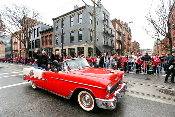 Johnny Bench (left) and baseball commissioner Rob Manfred made their way through the streets of downtown Cincinnati last year during the 100th annual Findlay Market Parade on Opening Day.